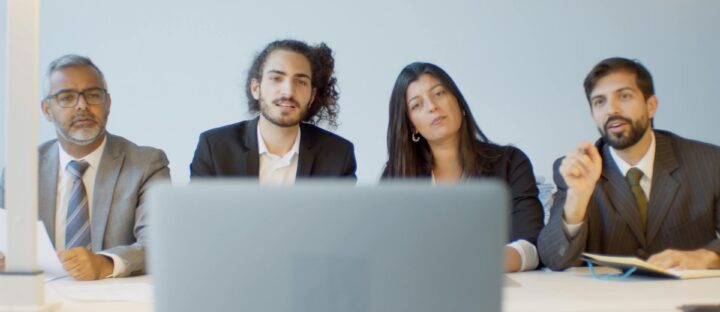 team of four people on conference call
