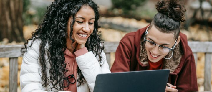 two people attending online meeting