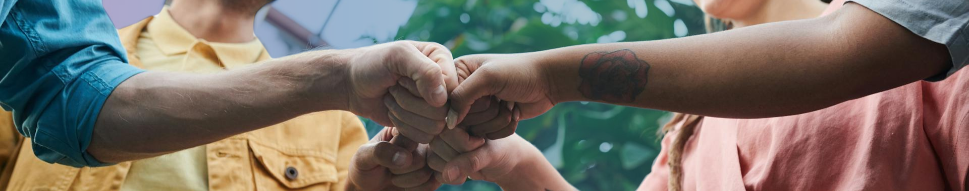 four-person fist bump