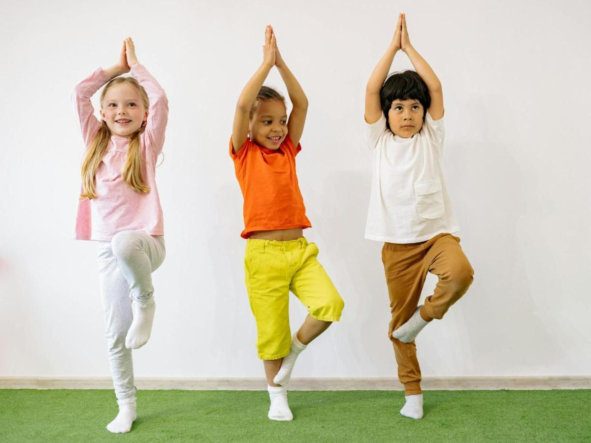 kids practicing yoga